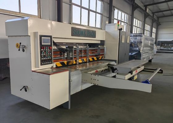 Macchina per la produzione di forme a scatola ondulata, macchina per il taglio a fuso con alimentatore automatico e dispositivo di riparazione della copertura dell'ancilla